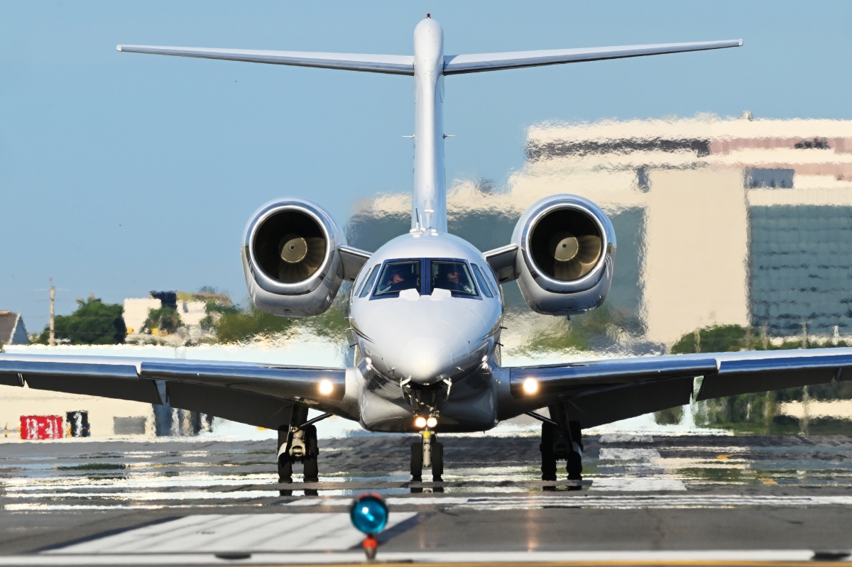 Business jet on tarmac under Part 91 management